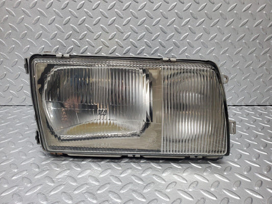 45826 Mercedes-Benz W126 420SE Headlight Right Bosch 0301065706 A1268209361