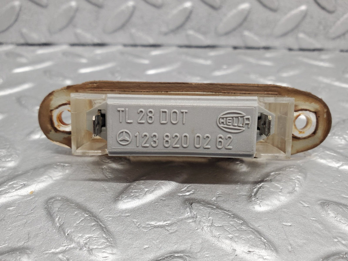 49635 Mercedes-Benz W123 Number Plate Light Hella A1238200262