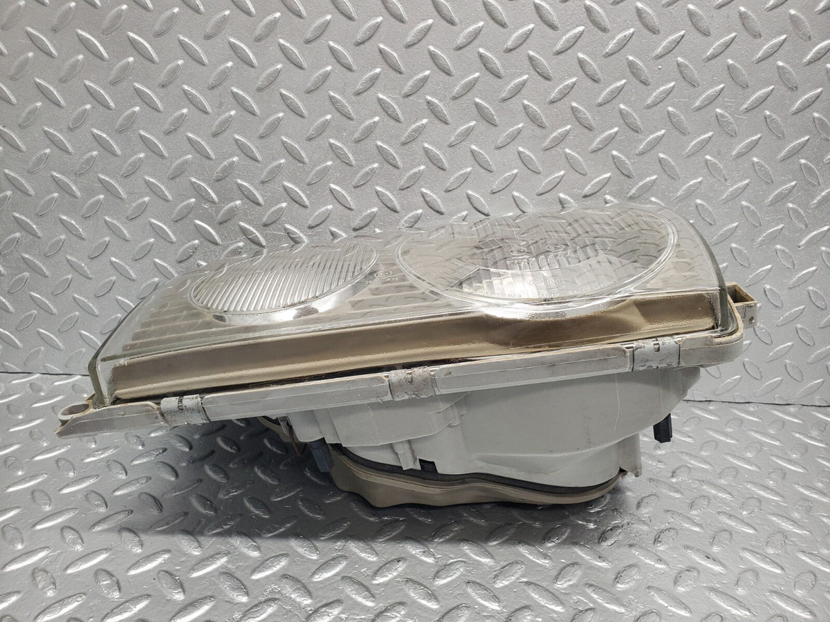 48727 Mercedes-Benz W123 Headlight Left Side Hella 117683-00 LI