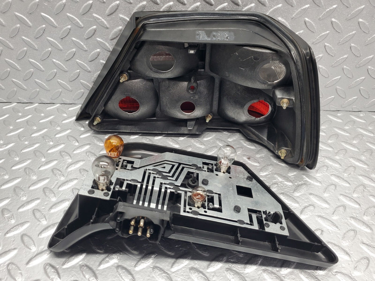 48939 Mercedes-Benz A124 320E Cabriolet Tail Light Left Side Hella