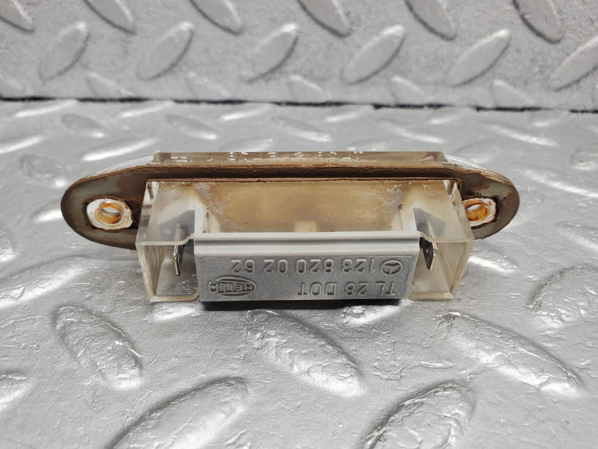 49635 Mercedes-Benz W123 Number Plate Light Hella A1238200262