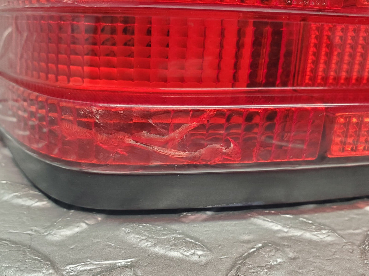48939 Mercedes-Benz A124 320E Cabriolet Tail Light Left Side Hella